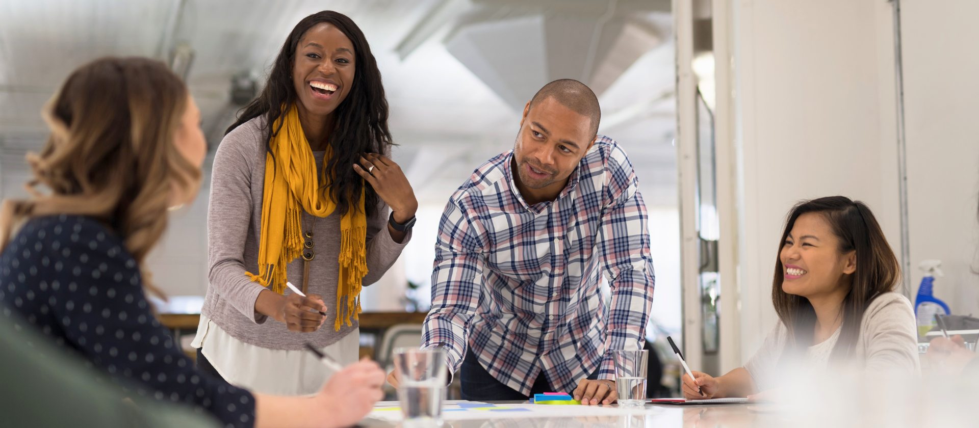 IChannel Technologies team collaborating around a table